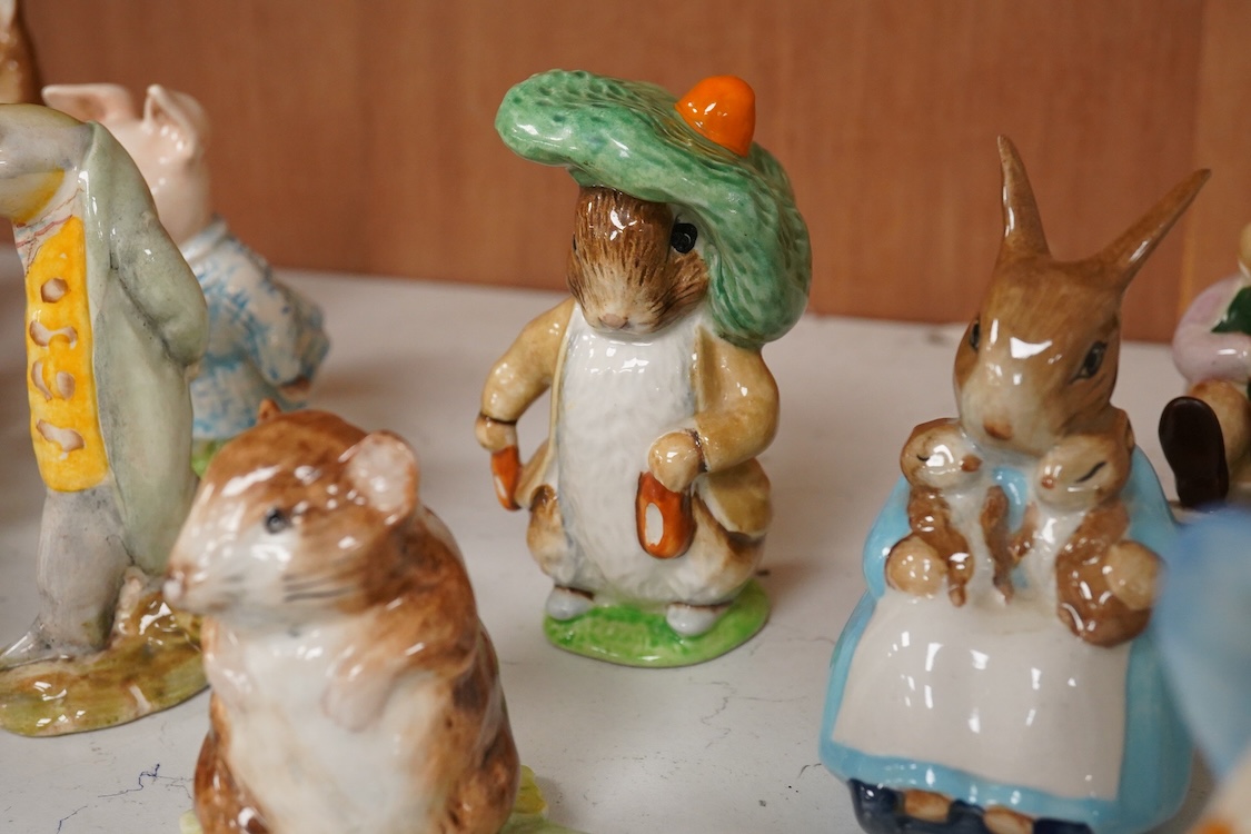 Twenty Beatrix Potter figures, mostly later production figures, largest 11cm high